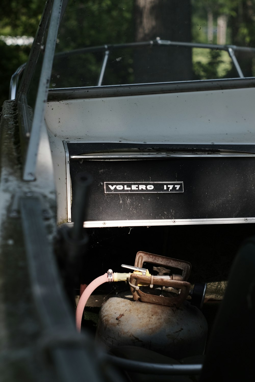 a close up of a gas tank in the back of a truck