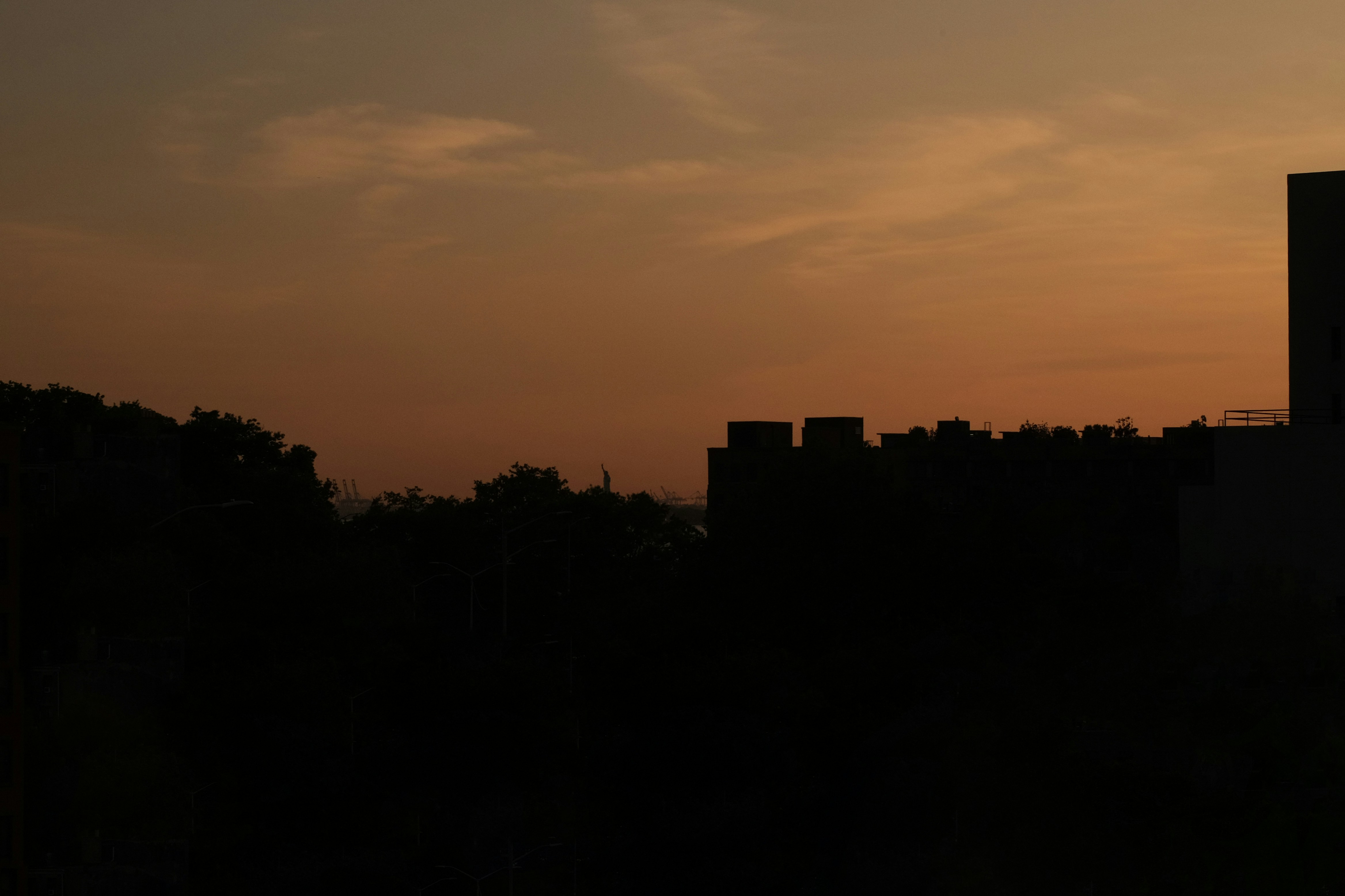 panoramic city view from a high-rise balcony at sunset - city apartment view