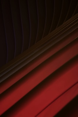 Dark-toned abstract visual of layered textures resembling sound vibrations.