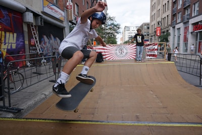 Close-up of a young skater gracefully performing a trick during a local competition.