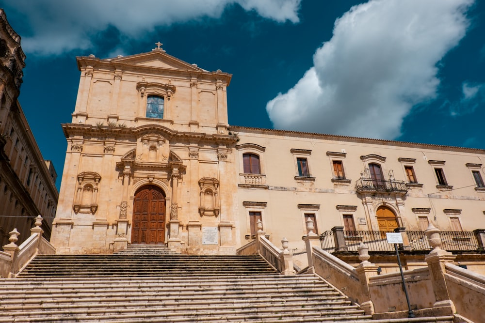 a large building with stairs leading up to it