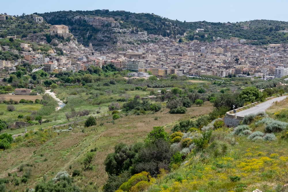 a view of a city from a hill