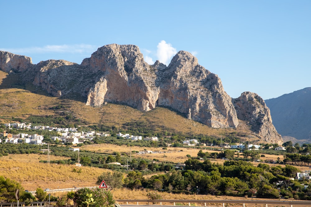 a view of a mountain range with a town below