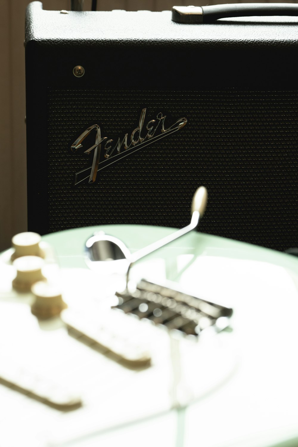 a guitar amplifier sitting on top of a table