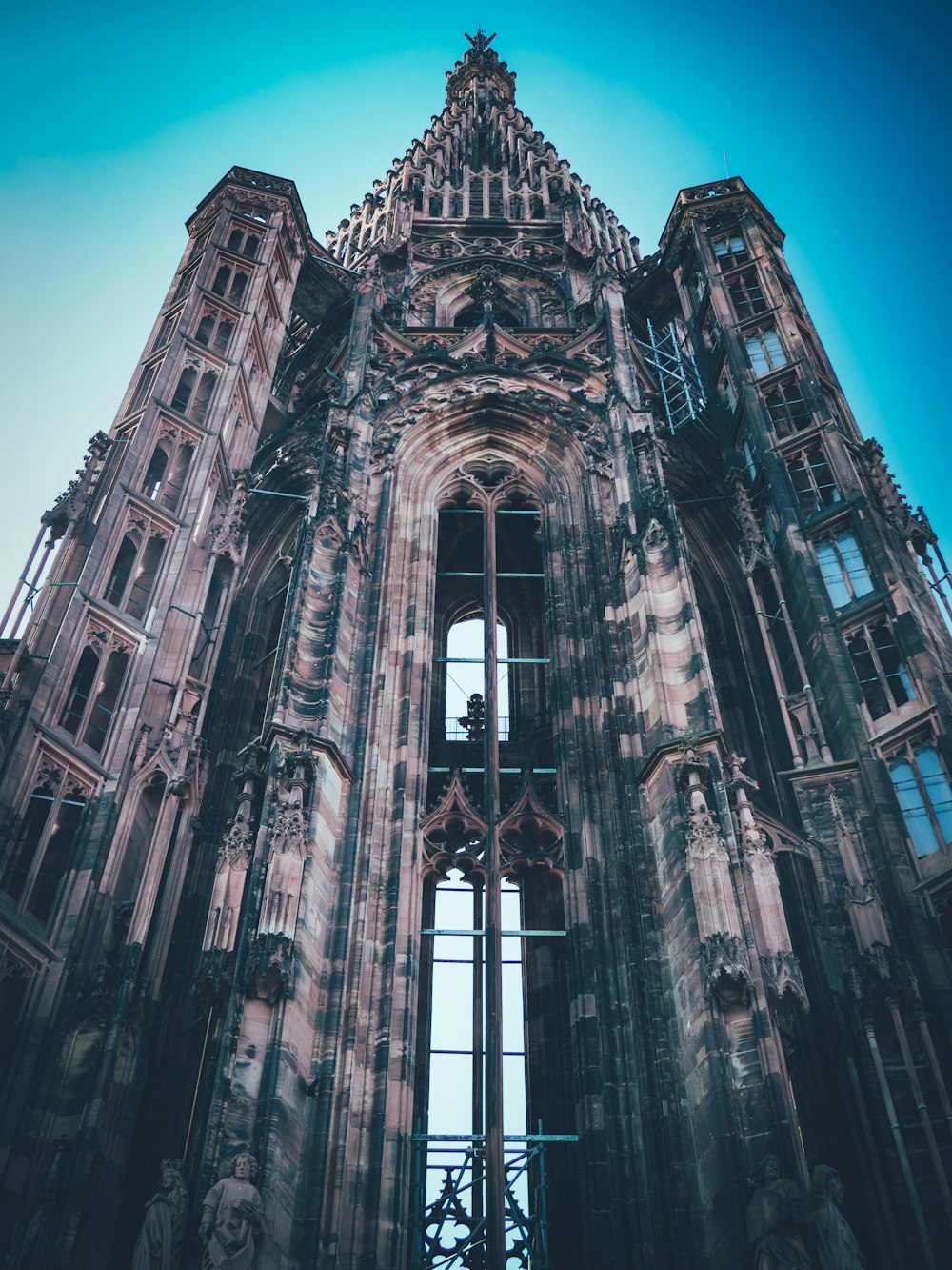 a very tall building with a clock on it's side