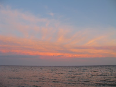 A calm ocean view at sunset, symbolizing peace and reflection.