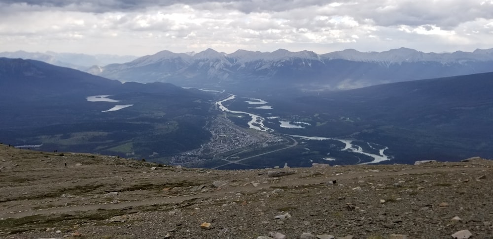 a view of a river running through a valley