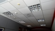 Fire-safety devices neatly integrated into the ceiling of a commercial building.