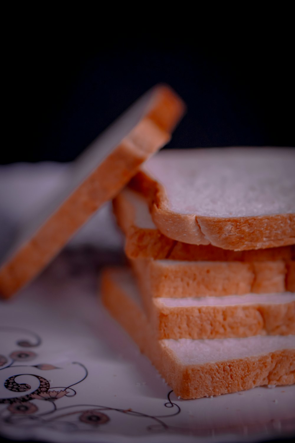 a close up of slices of bread on a plate