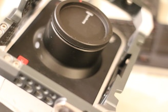 Close-up of a sleek CalibraLock camera mount attached firmly to an 18 wheeler, showing its sturdy design.