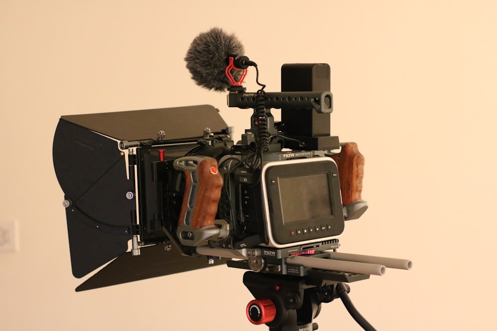 a camera with a microphone attached to it