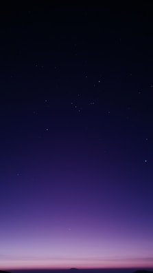 A twilight sky with stars aligning, evoking dreams yet to unfold.