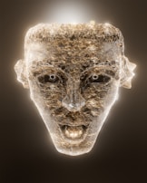 A glowing, textured sculpture of a human face made of stone with a luminous outline and bright facial features against a dark background. The mouth is slightly open, providing a dramatic, ethereal appearance.