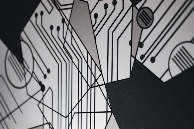 Abstract geometric shapes interlaced with circuit patterns in deep navy and black hues, evoking a high-tech atmosphere.