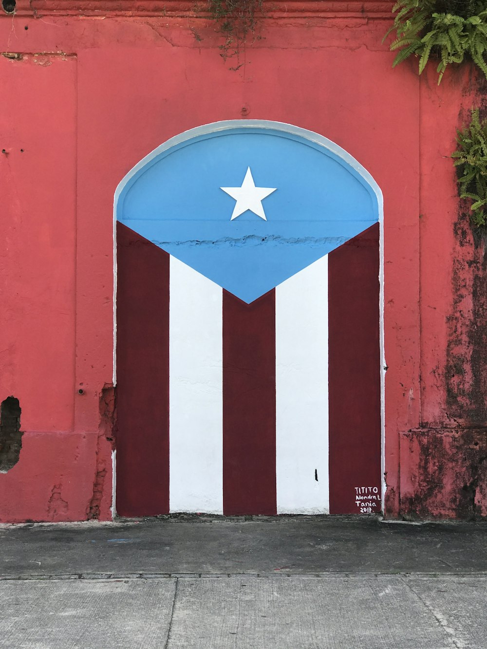 a red, white and blue door with a star on it