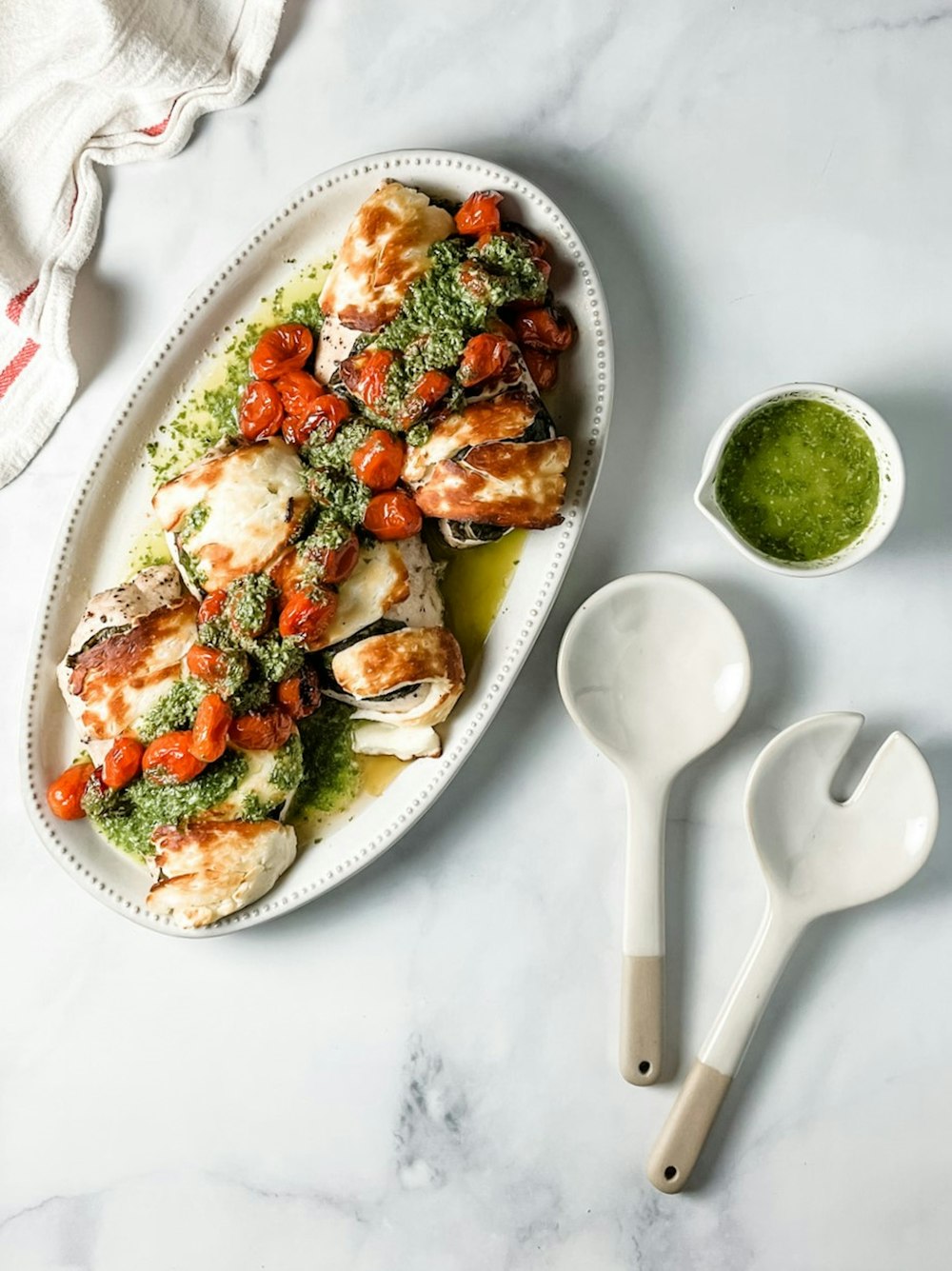 a plate of food on a marble table