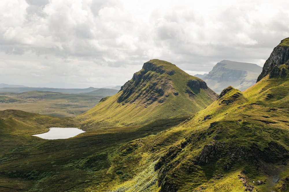 a mountain range with a lake in the middle of it