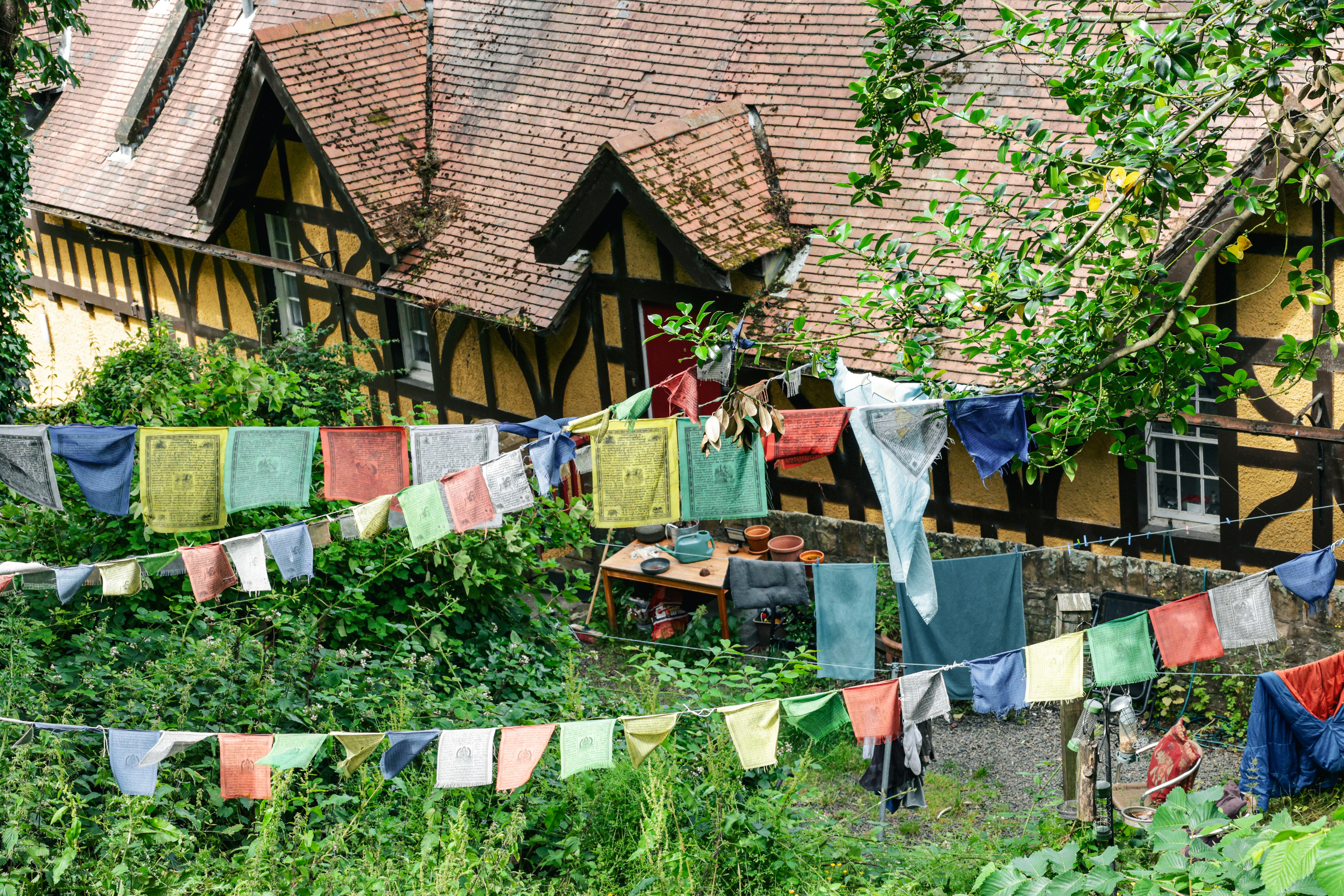 a house with a lot of clothes hanging out to dry