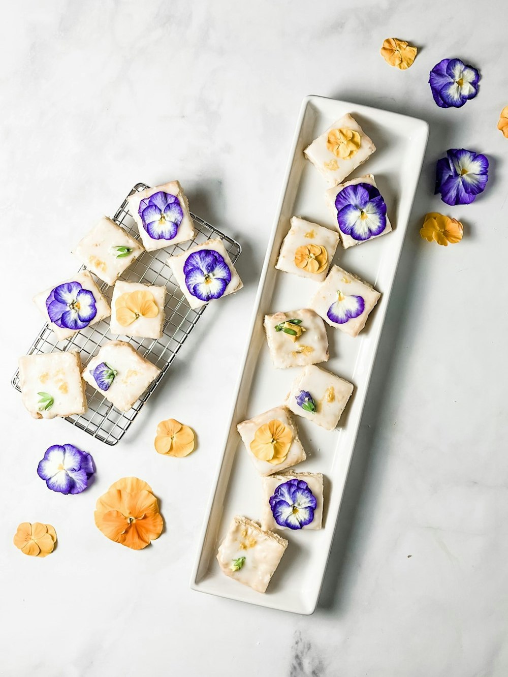 a white plate topped with cut up flowers next to a cooling rack