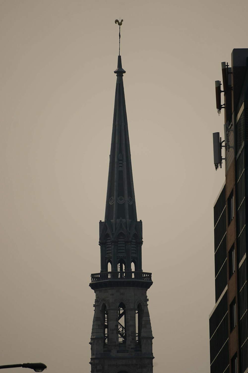 a steeple of a building with a clock on it