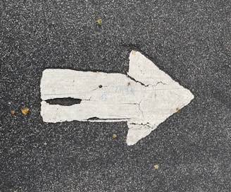 a piece of paper that has been placed on the ground