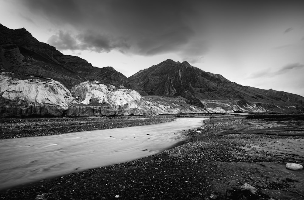 a black and white photo of a mountain range