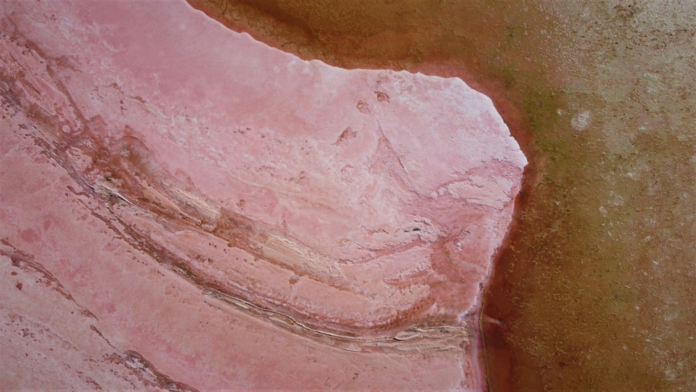an aerial view of a pink rock formation