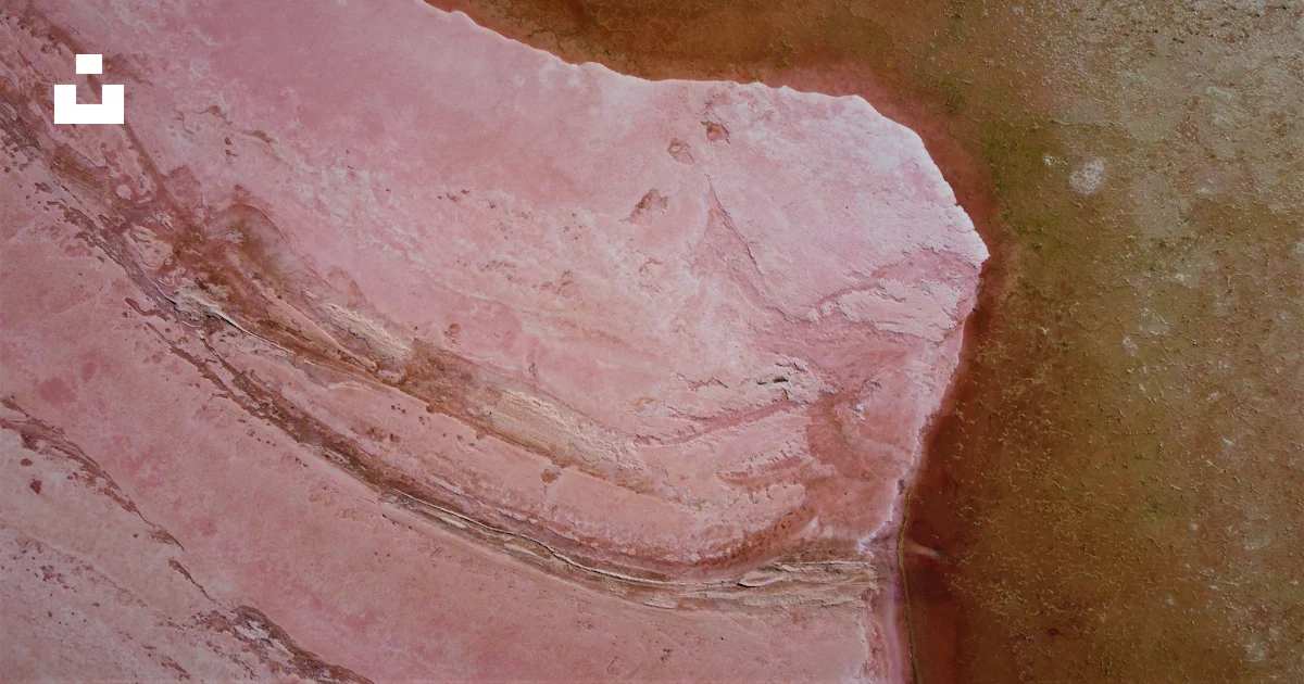An aerial view of a pink rock formation photo – Free Australia Image on ...