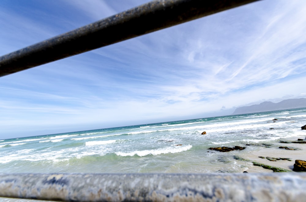 a view of the ocean from a beach