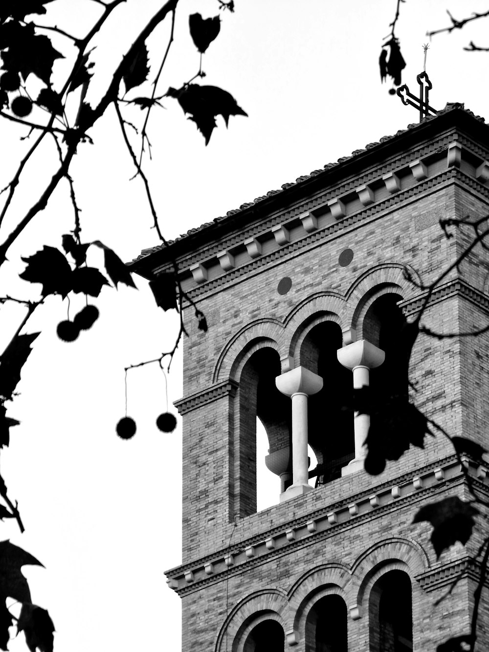 a black and white photo of a clock tower