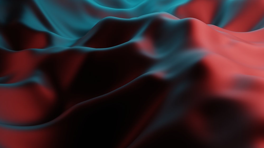 a red and blue background with wavy lines