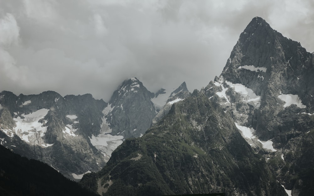 a very tall mountain with snow on it