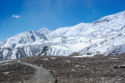 a mountain with a trail going through it