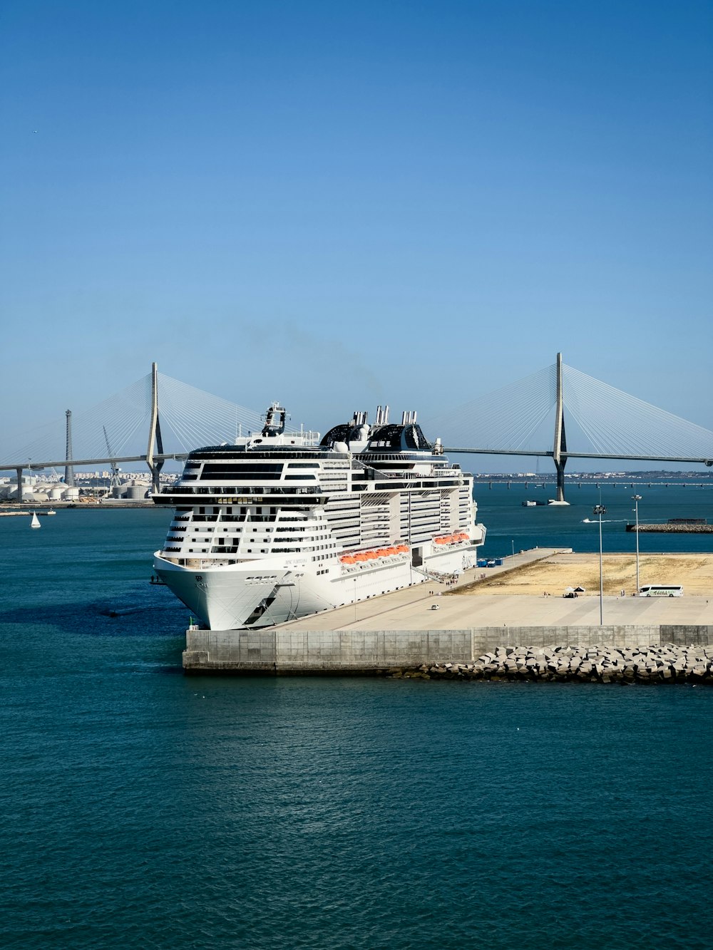 a cruise ship is docked at a dock