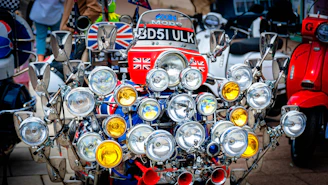 A lively scooter rally with colorful Lambrettas lined up and smiling enthusiasts.