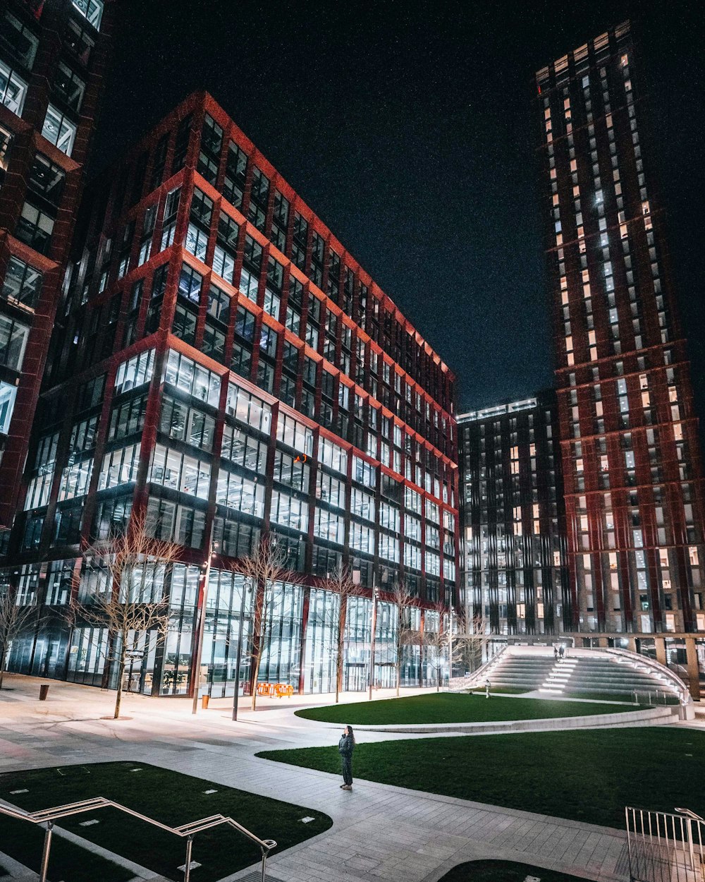 a large building with a lot of windows at night