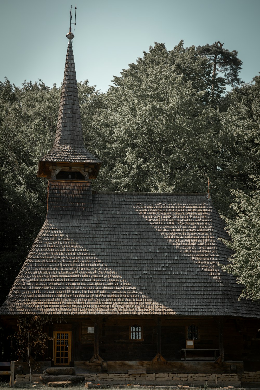 a church with a steeple and a clock tower