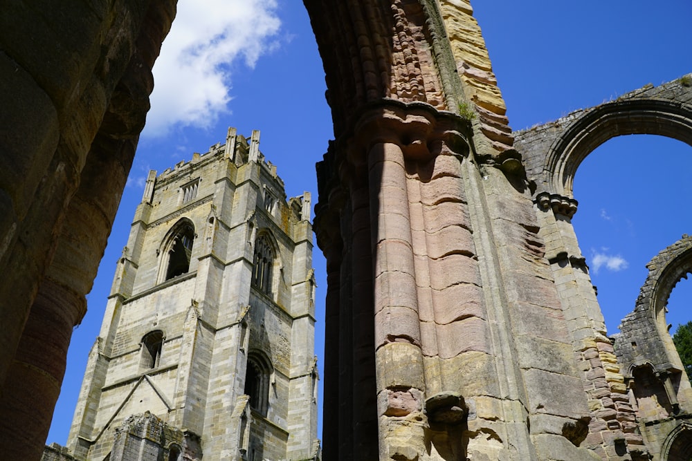 a view of a church through an arch