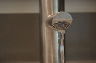 A satisfied customer with a repaired faucet.