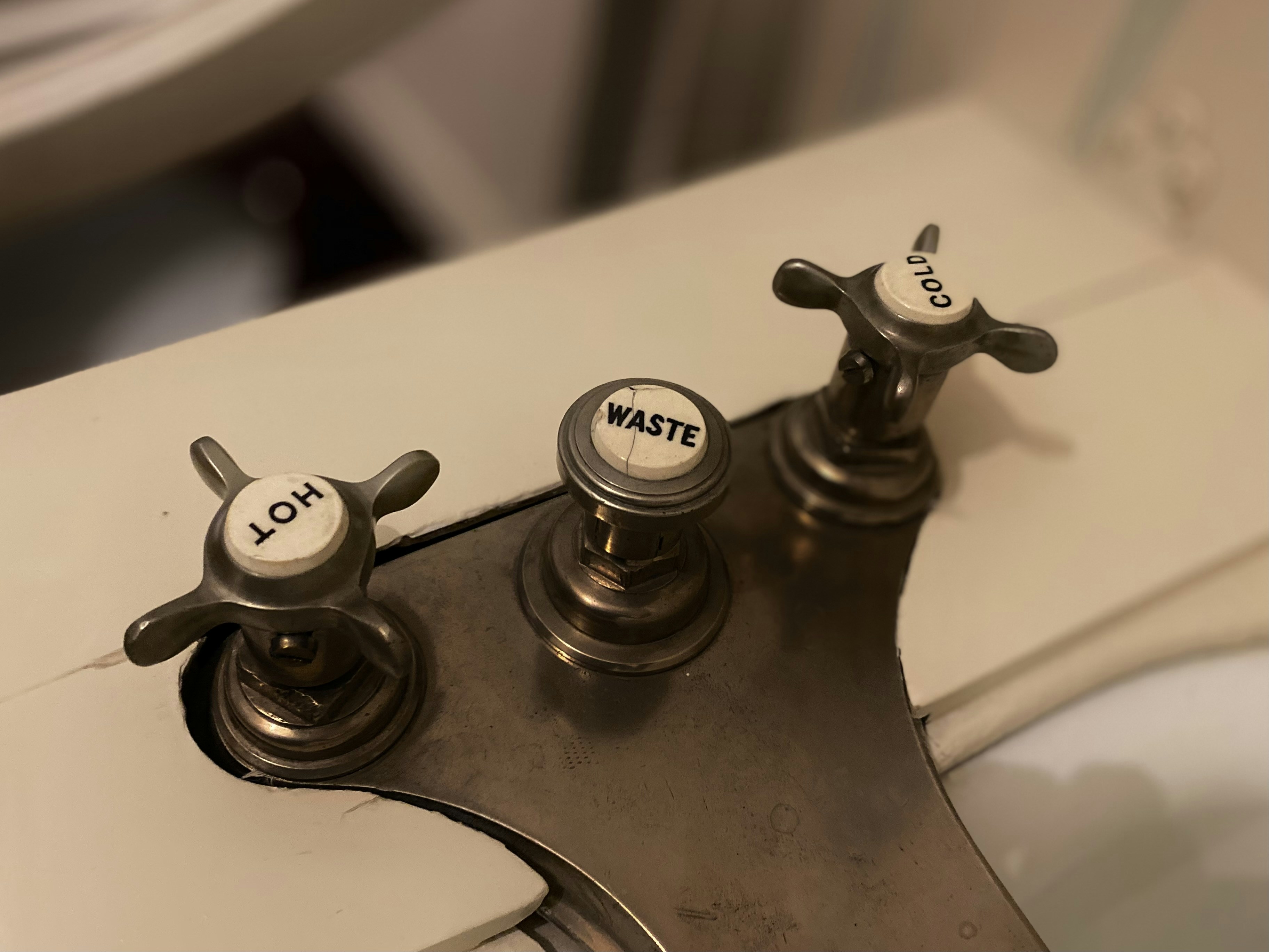 Bathroom sink with two knobs
