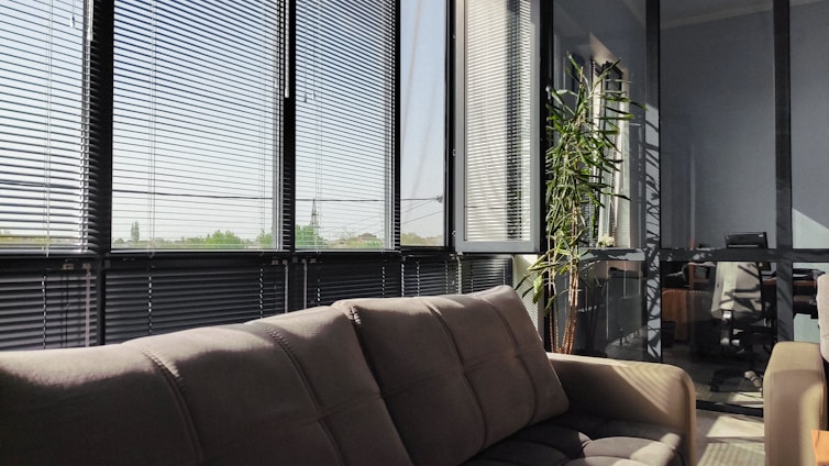 A cozy living room in Chicago Heights showcasing elegant blinds and drapes from Prestige Blinds & Drapes IL.