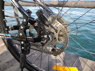 Side view of a sleek dingxial brake caliper mounted on a mountain bike