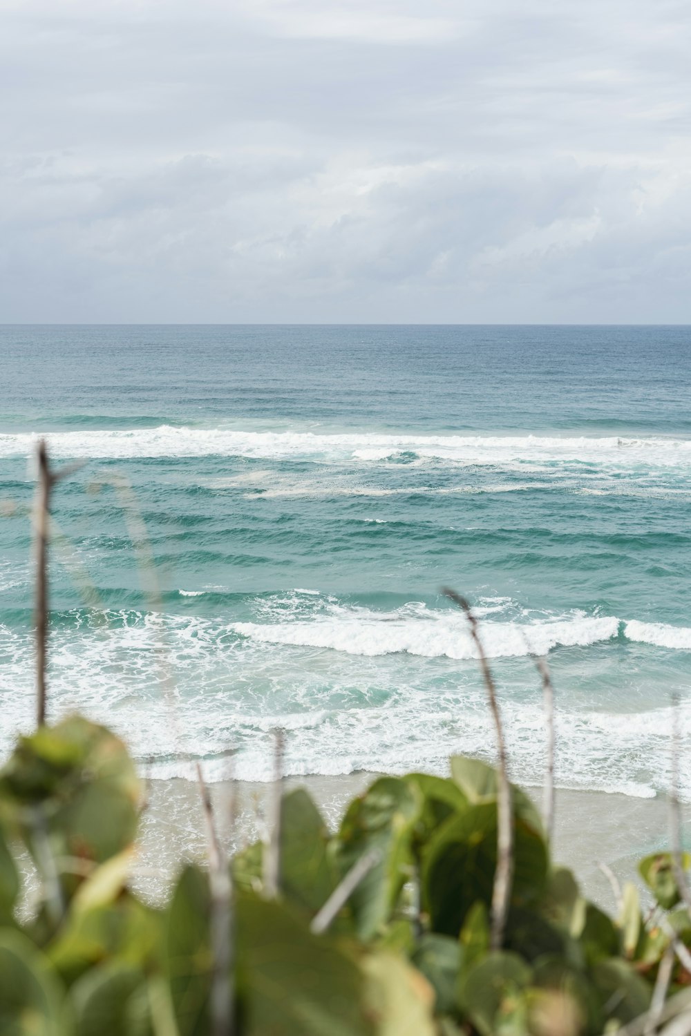 a person riding a surfboard on a wave in the ocean