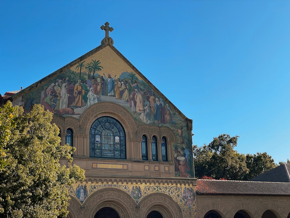 a church with a mural on the side of it