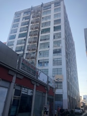 Wide shot of a commercial building equipped with fire safety devices.