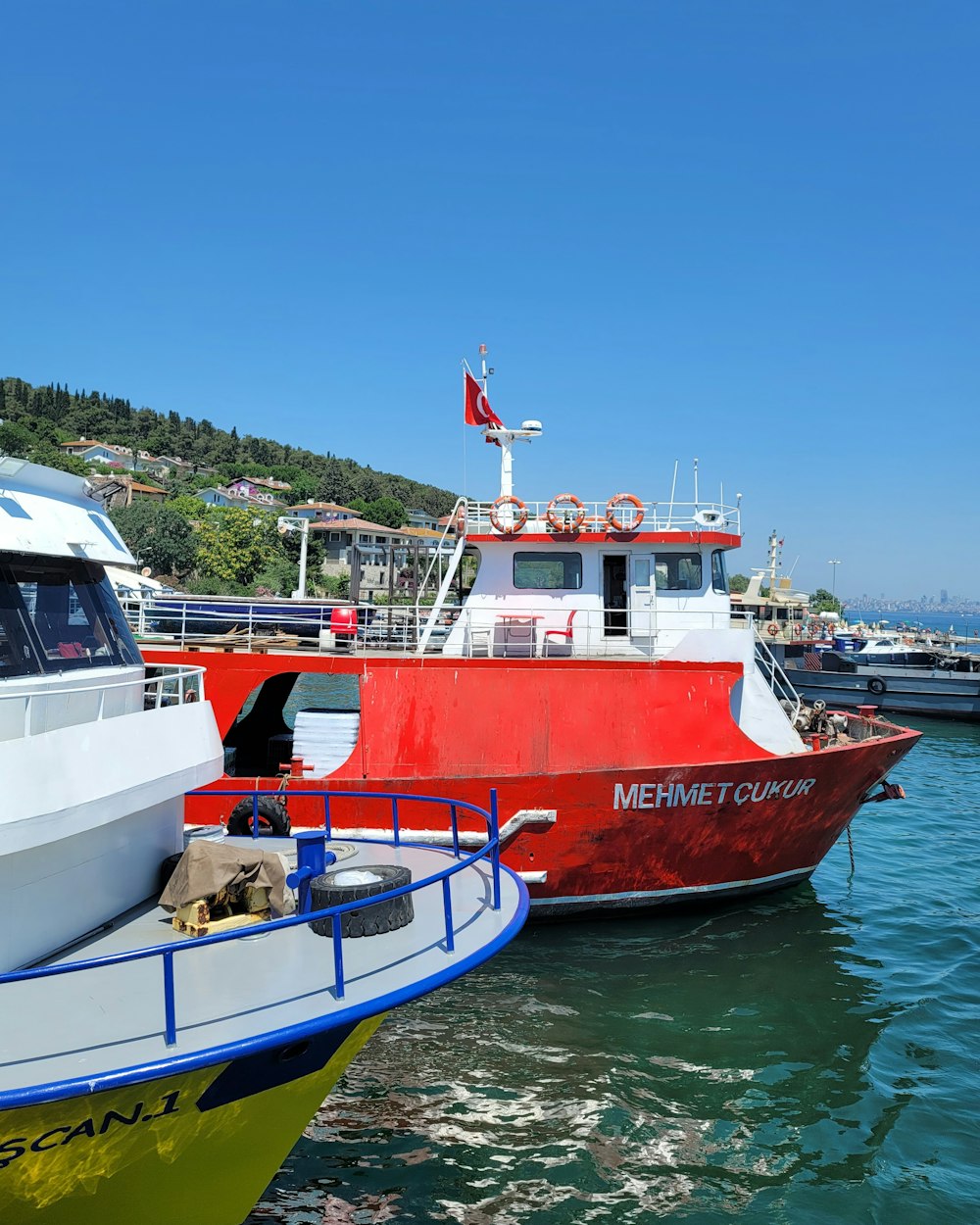 a couple of boats that are sitting in the water