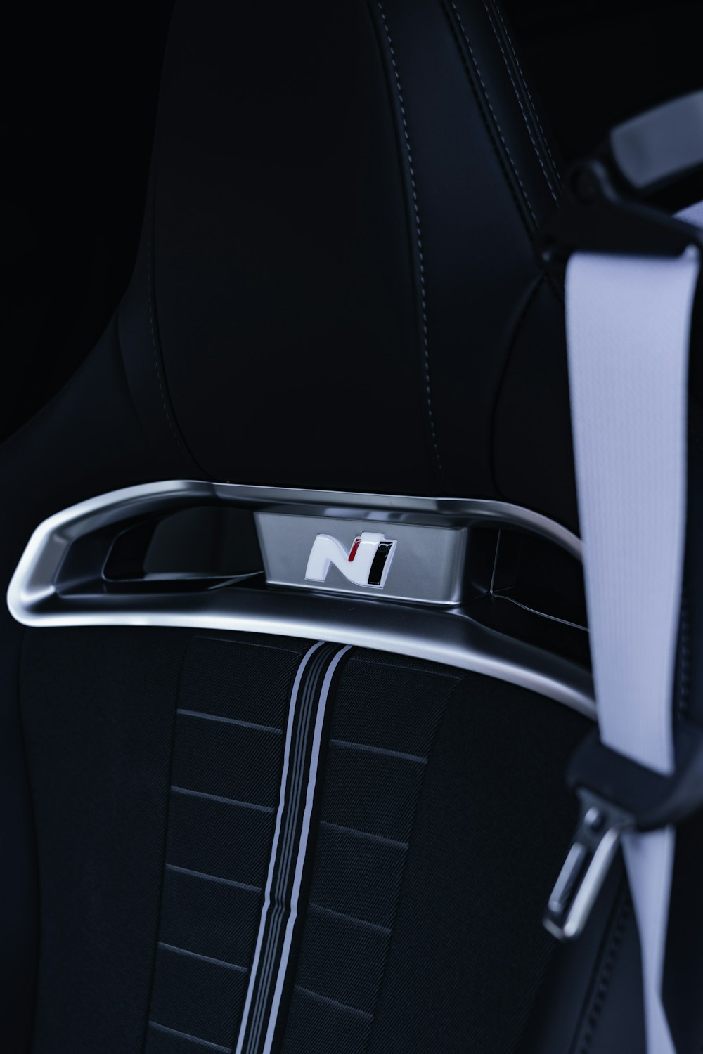 a close up of a seat belt on a car