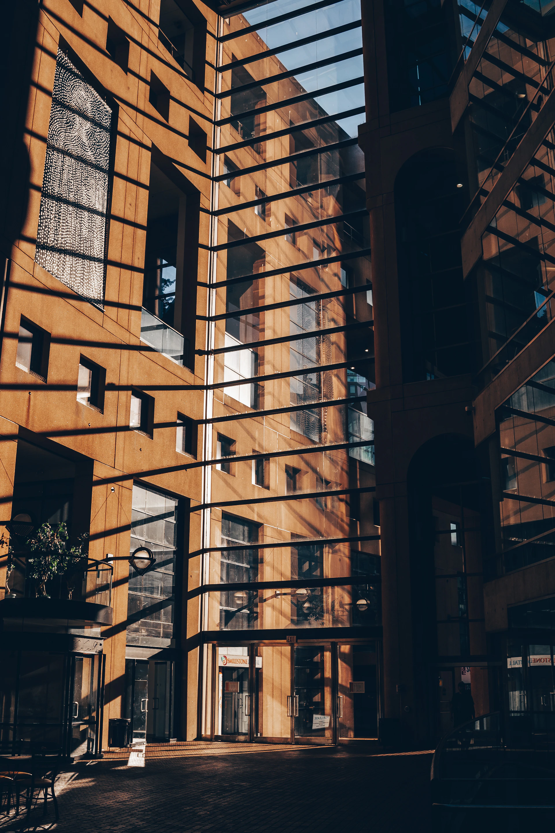 woman wearing yellow long-sleeved dress under white clouds and blue sky during daytime