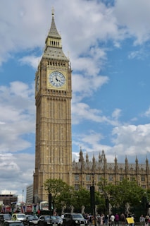 a large clock tower towering over a city