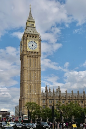 a large clock tower towering over a city
